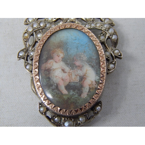 245D - Victorian Gold & Silver Mourning Locket: The Hand Painted Portrait Panel Depicting Two Cherubs withi... 