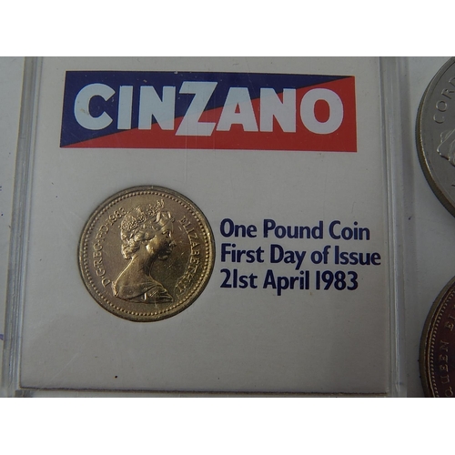 155G - First day of issue £1 Coin 21st April 1983 together with six £5.00 commemorative crowns.