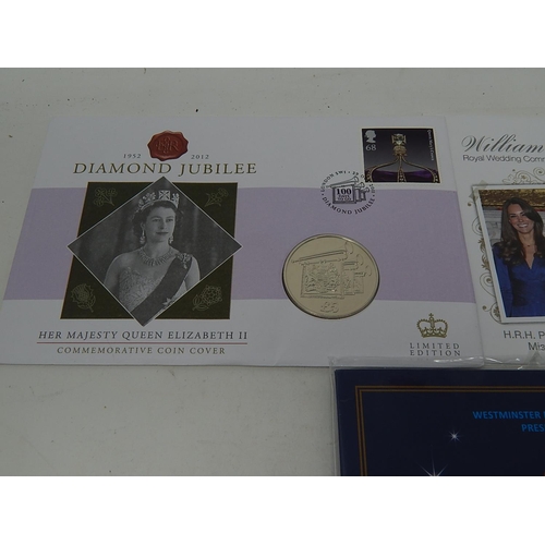 100 - The Gift of Christmas £20 Fine Silver coin; Peter Pan 50 Pence collection; The Pantomime 50p coin co... 