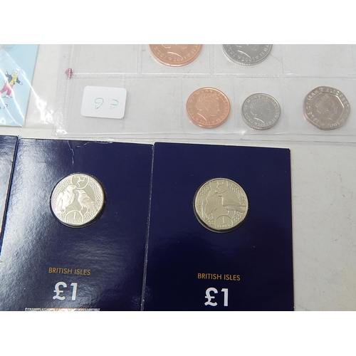 103 - 3 x Isle of Man £1 coins dated 2017 in wallets; 2 x Isle of Man Rupert Bear 50p coins in packs; 3 x ... 