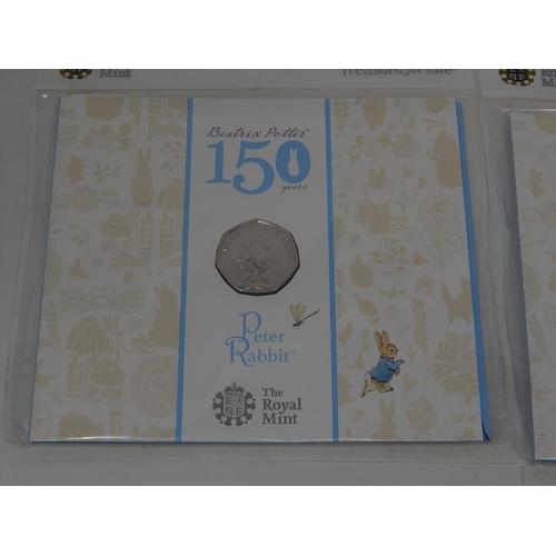 81 - Collection of 8 x Commemorative 50p coins inc Beatrix Potter, Wallice and Gromit etc, all housed in ... 