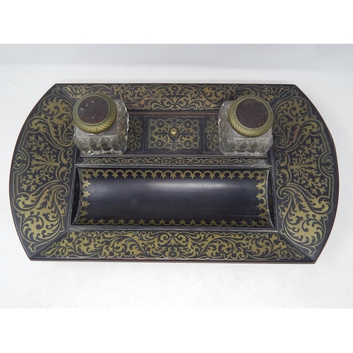 143 - C19th Brass Inlaid Twin Inkwell Stand c.1850 with Cut Glass Inkwells sitting on four bun feet: Measu... 