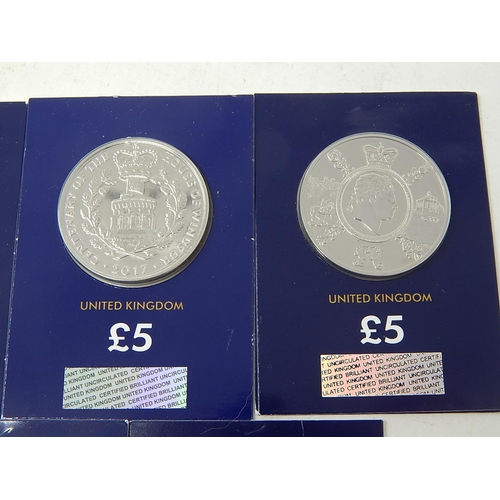 129 - Collection of 7x Commemorative £5 coins in Change Checker cards