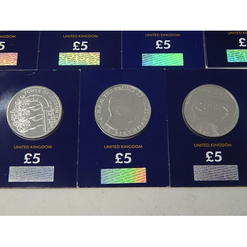 129 - Collection of 7x Commemorative £5 coins in Change Checker cards