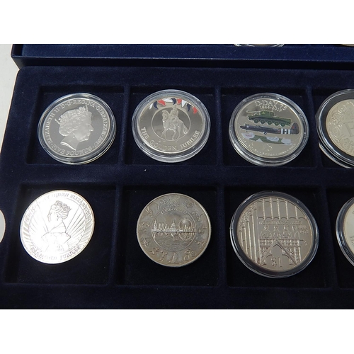 147 - A collection of £5 Commemorative Coins and other Crown Size World and GB issues all housed in a 2-tr... 