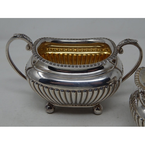 162 - Victorian Silver Strawberry set comprising Sugar Bowl & Cream Jug: Hallmarked Sheffield 1892 by Jame... 