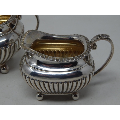 162 - Victorian Silver Strawberry set comprising Sugar Bowl & Cream Jug: Hallmarked Sheffield 1892 by Jame... 