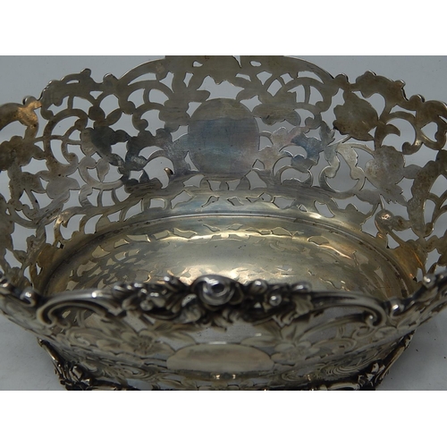 232 - Victorian Pierced Silver Bread Basket with rococo decoration & two blank cartouches: Hallmarked Lond... 