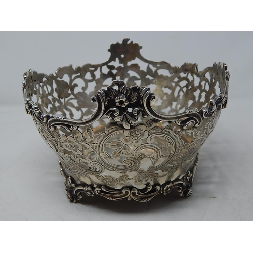 232 - Victorian Pierced Silver Bread Basket with rococo decoration & two blank cartouches: Hallmarked Lond... 