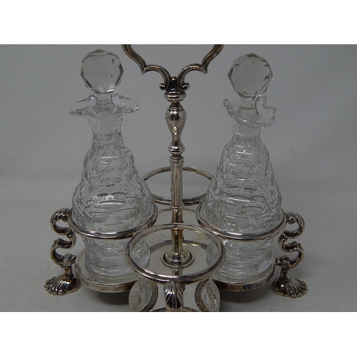 235 - George IV Silver Wood Based Cruet Stand with Two Cut Glass Bottles Sitting on Four Cast Shell Feet: ... 