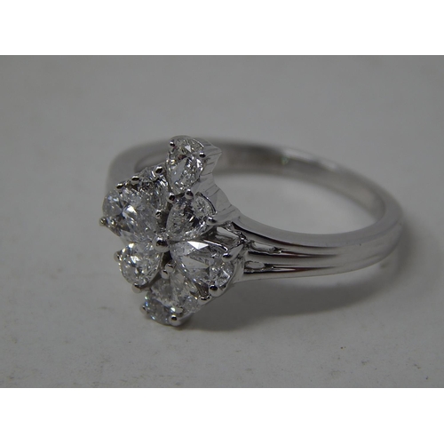 250 - 18ct White Gold Ring Inset with 8 Pear Shape Diamonds Estimated at 1.00ct: Ring Size N: Gross weight... 