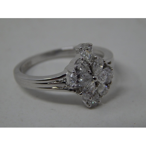 250 - 18ct White Gold Ring Inset with 8 Pear Shape Diamonds Estimated at 1.00ct: Ring Size N: Gross weight... 