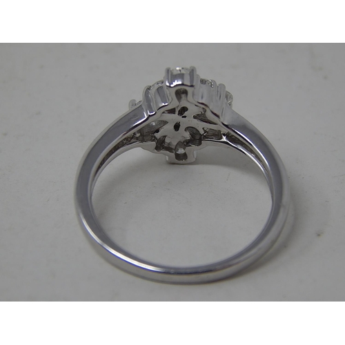 250 - 18ct White Gold Ring Inset with 8 Pear Shape Diamonds Estimated at 1.00ct: Ring Size N: Gross weight... 