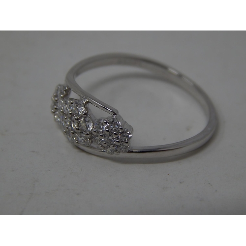 251 - 950 Platinum Diamond Set Flowerhead Ring: The Diamonds Totalling 0.5cts: Ring Size N: Gross weight 2... 