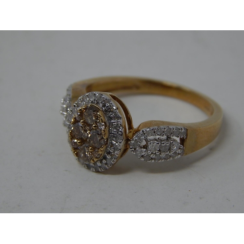 252 - 9ct Yellow Gold Ring Set with a Central Cluster of Yellow Diamonds within a Border of White Diamonds... 