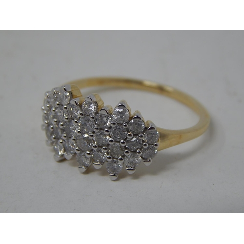 257 - 9ct Yellow Gold Ring Inset with 28 Brilliant Cut White Diamonds: Ring Size N: Gross weight 5.2g