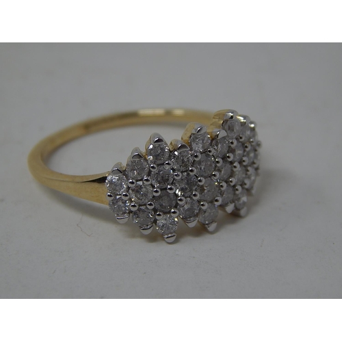 257 - 9ct Yellow Gold Ring Inset with 28 Brilliant Cut White Diamonds: Ring Size N: Gross weight 5.2g