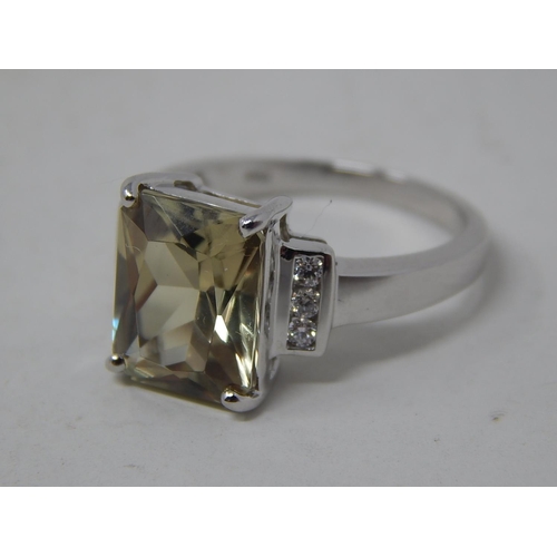 258 - 18ct White Gold Ring Set with a Central Zultanite Measuring 5.2cts Flanked Either Side by Three Bril... 