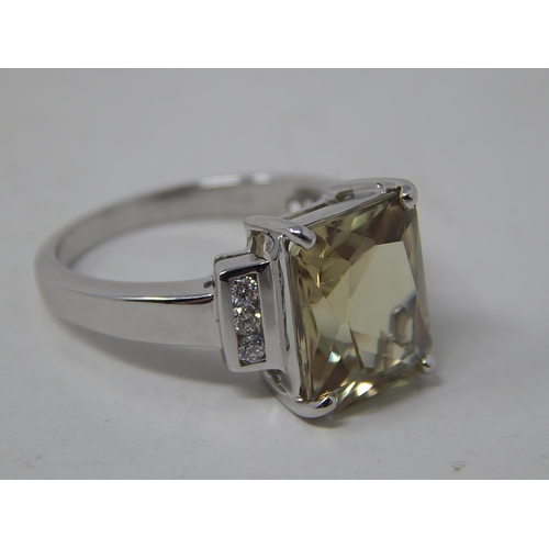 258 - 18ct White Gold Ring Set with a Central Zultanite Measuring 5.2cts Flanked Either Side by Three Bril... 