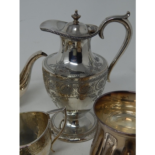 221 - Quantity of Silver Plated Wares to Include a Three Piece Tea Set, Claret Jug, Gravy Boat etc.