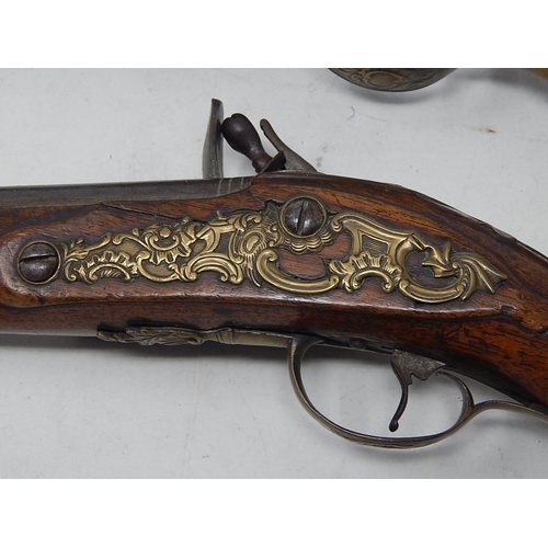 371 - A Fine Pair of C19th Continental Flintlock Pistols with Walnut Stocks & Brass Furnishings: Each Meas... 