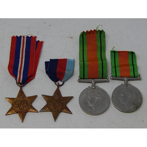 378 - WWII: Four Medals Comprising The Star 1945-1949 (2) together with The Victory Medal (2)