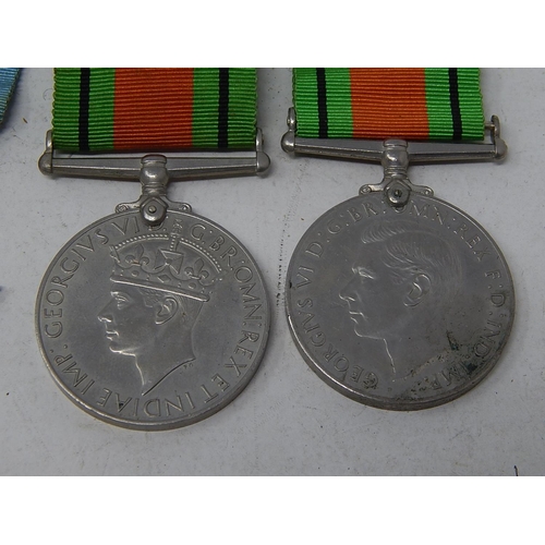 378 - WWII: Four Medals Comprising The Star 1945-1949 (2) together with The Victory Medal (2)