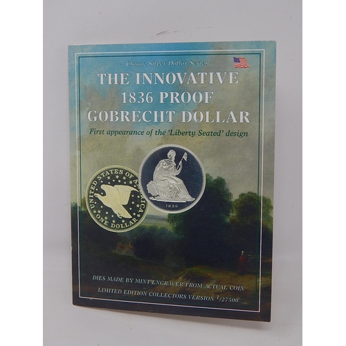 17 - A collection of 3 x Innovative 1836 Proof Gobrach Dollars in illustrated and informative folder, pla... 