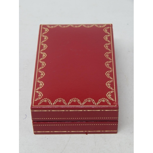 153 - CARTIER: 18ct Gold Lighter Stamped 750: Serial No: 66187: Gross weight 90g: In Red Cartier Box.