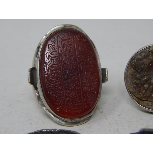 443 - Six Islamic seal rings including early terracotta & carnelian examples