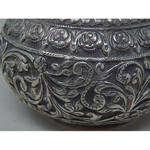 134 - Asian White Metal Vase with Intricate Decoration: Measures 11cm diameter x 9.6cm high: Weight 332g: ... 