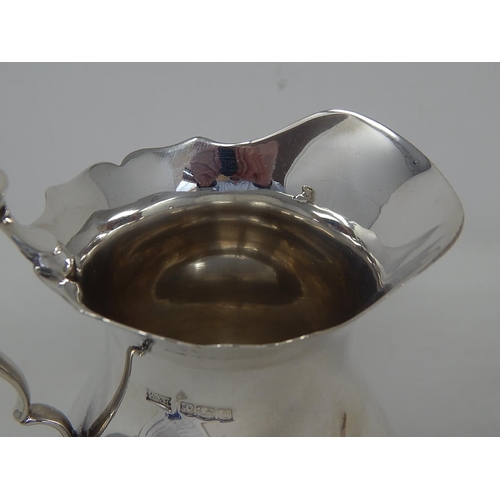 142 - HUGE Silver Milk Jug: Hallmarked Sheffield 1922 by Walker & Hall: Measures 14.8cm high: Weight 286g