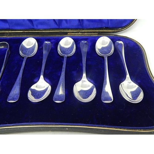 143 - Antique Set of 12 Silver Teaspoons & Tongs: Hallmarked Sheffield 1912 by William Hutton & Sons in Or... 