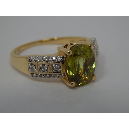 186 - 18ct Gold Ring Inset with a Central Ambilohe Sphene Estimated at 3.00cts & Diamond Shoulders: Ring S... 