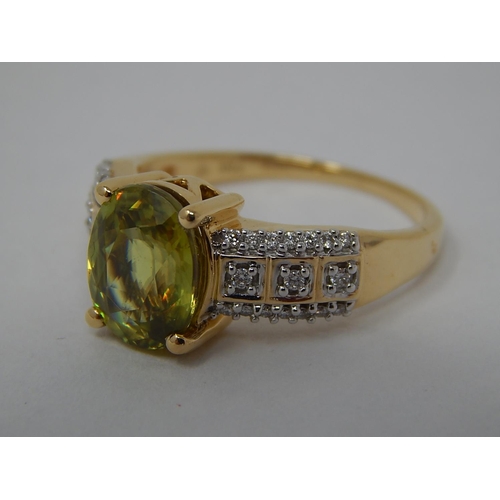 186 - 18ct Gold Ring Inset with a Central Ambilohe Sphene Estimated at 3.00cts & Diamond Shoulders: Ring S... 