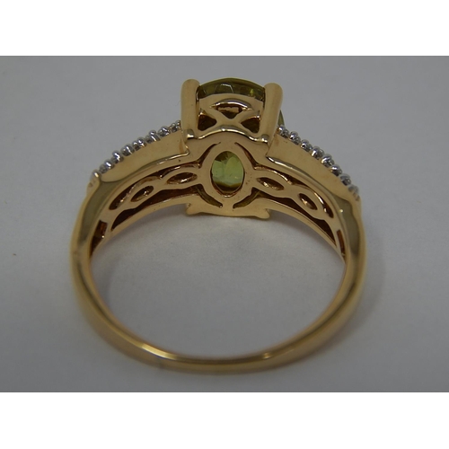 186 - 18ct Gold Ring Inset with a Central Ambilohe Sphene Estimated at 3.00cts & Diamond Shoulders: Ring S... 