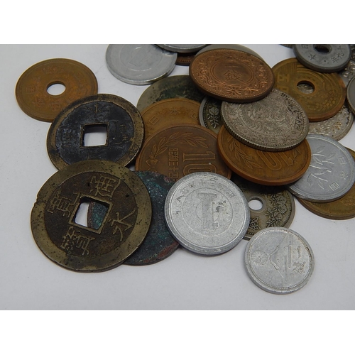 26 - Quantity of Chinese/Japanese Coins together with a 1 Yen Banknote.