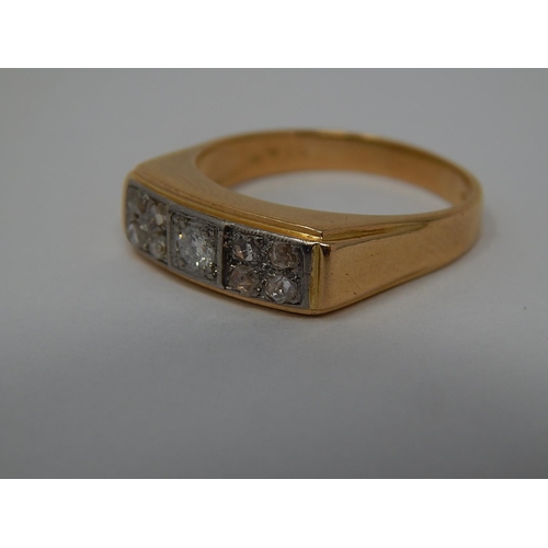 96 - 18ct Gold Diamond Set Ring: Inset with a Central Brilliant Cut Diamond & Flaked Either Side by Four ... 