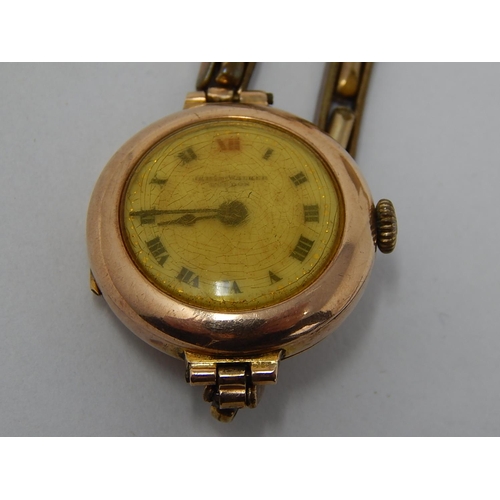 71 - 9ct Gold Cased Ladies Wristwatch on Plated Strap.