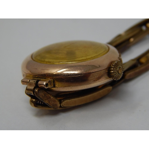 71 - 9ct Gold Cased Ladies Wristwatch on Plated Strap.