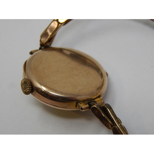 71 - 9ct Gold Cased Ladies Wristwatch on Plated Strap.