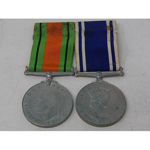 312 - 2 x Mounted Medals Inc WW2 Defence & Named Police Exemplary Service Medal. 111427