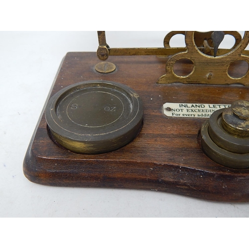 494 - Antique Brass Postal Scales complete with weights.