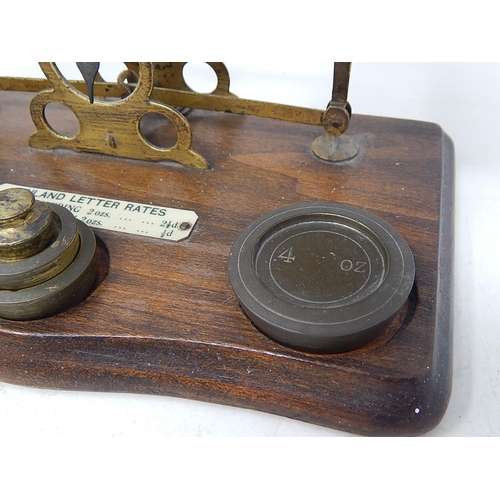 494 - Antique Brass Postal Scales complete with weights.