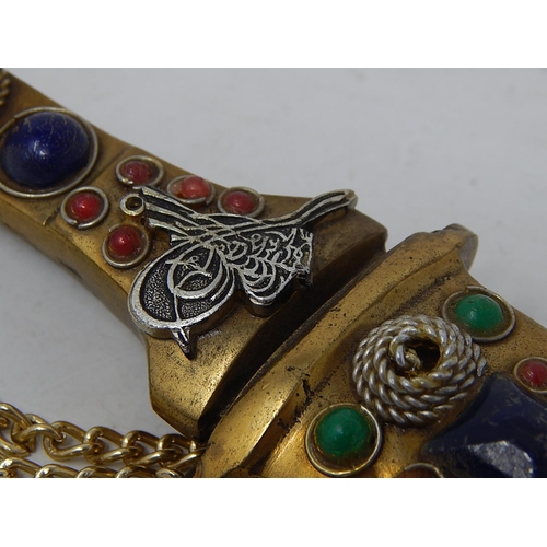 503 - Turkish Dagger & Scabbard Decorated with Polished Cabochons & Rope Detail: Measures 26.5cm