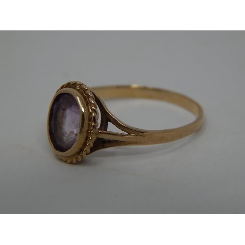 209 - 9ct Gold amethyst ring. 311603