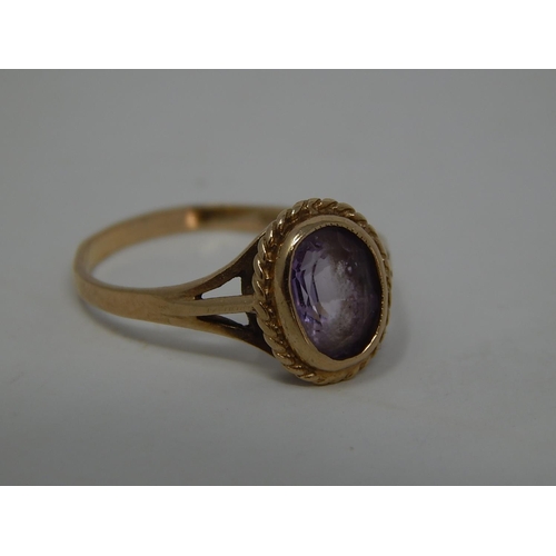 209 - 9ct Gold amethyst ring. 311603