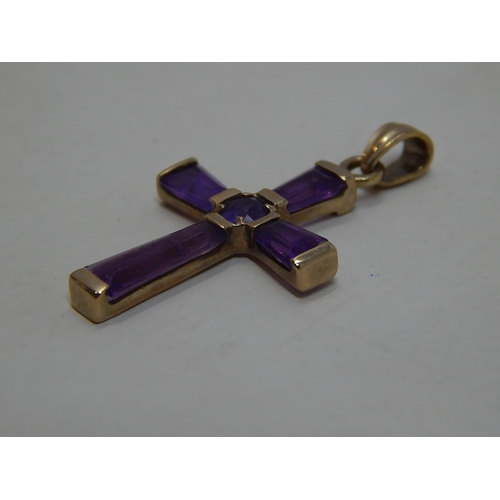 212 - 9ct Gold amethyst set cross pendant. 501625