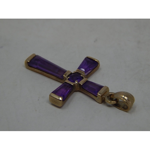 212 - 9ct Gold amethyst set cross pendant. 501625