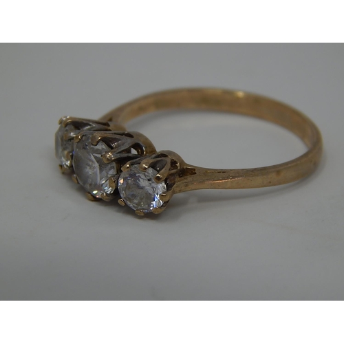 215 - 9ct Gold Gemset Trilogy Ring. 987871